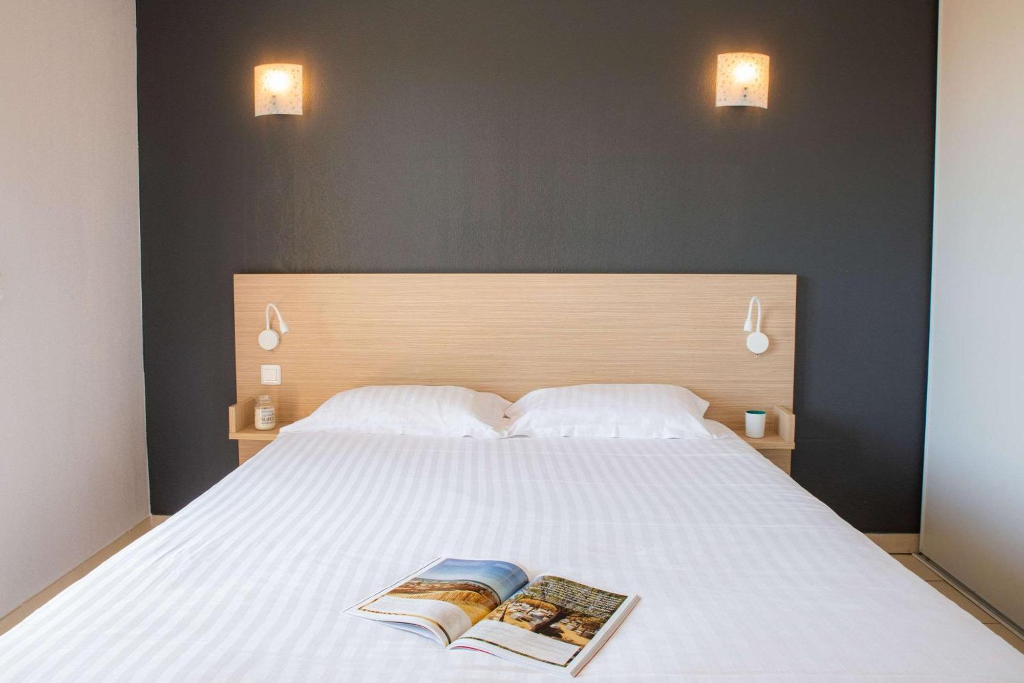 เซอนิตู้ด โฮเต็ล แอนด์ เรสซิเดนซ์ ลา ตูร์ เดอ มาร์ Hotel เฟรฌูส ภายนอก รูปภาพ